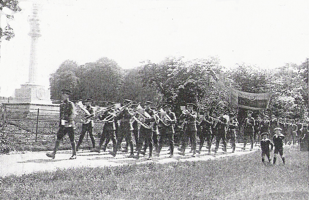 Nonington members of the British Legion parading past the Knolton War memorial, warly 1920's